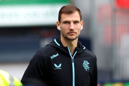 Borna Barisic arrives in Dingwall wearing tracksuit and Airpods